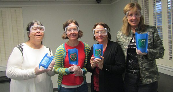 Crafters etch glass at Medfield library