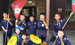 Walpole Cub Scouts give school a spring cleaning