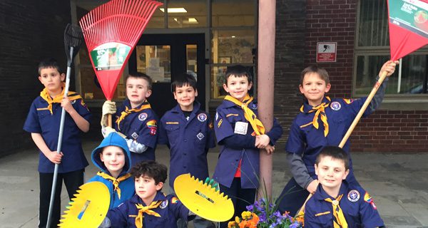 Walpole Cub Scouts give school a spring cleaning