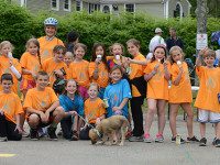 Kids PMC races though Westwood