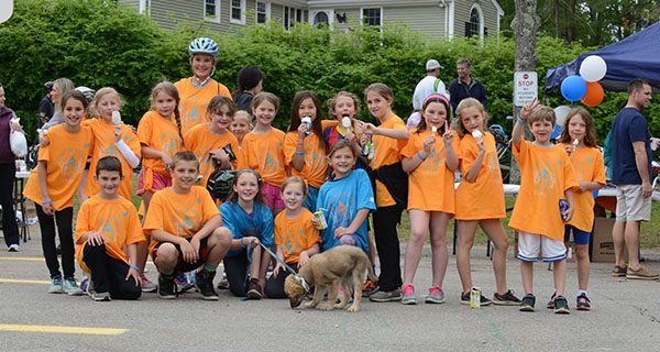 Kids PMC races though Westwood