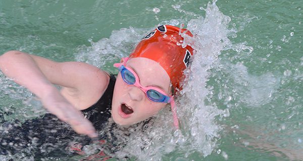 Walpole swim team beats Needham