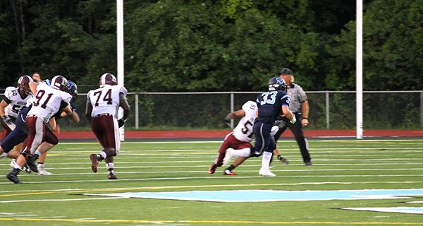 Warriors down Dedham 21-6 in opener