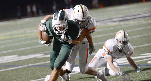 Westwood Football rolls in conference opener