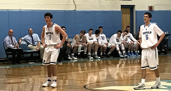 Lowell’s heroics propel hoop to victory