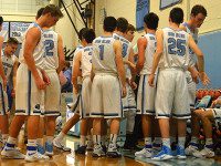 Boys hoop bounces back with big win