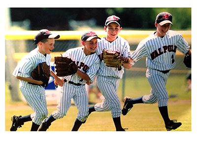 A member of the 2007 12-year old Walpole Little League team that made it all the way to Williamsport, Adams’ days as a baseball star began long before his time at Walpole High and BC. From left to right: P.J Hayes, Michael Rando, Johnny Adams, and Tim Sullivan celebrate one of their many victories in 2007 before heading to Williamsport later that summer.  