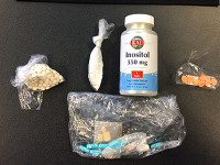 Walpole raid yields drugs, firearms