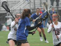 Wellesley, DS girls battle in wet Raider Bowl