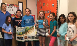 Rotarians distribute saplings to kids