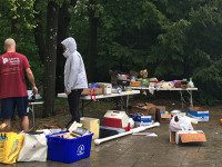 Annual Cure SMA Yard Sale braves the rain