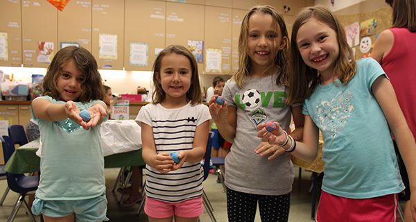 Children design bouncy balls at Library