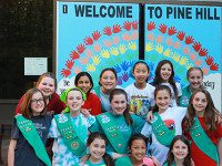 Sherborn Girl Scouts repaint Pine Hill doors