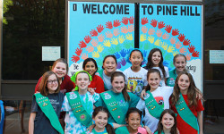 Sherborn Girl Scouts repaint Pine Hill doors