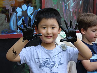 Owen shows off his painted hands.  Photos by Peter Kougias