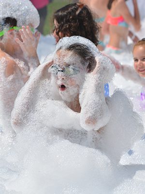 Goggles were a necessity for any children who wanted to dive into the foam.  Photos by Elizabeth Collotta 