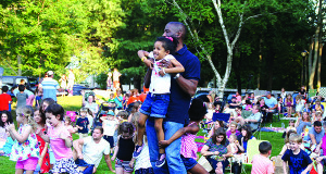 The Medfield summer concert provided a space for parents and children to relax and spend time together as a family.  Photos by Judy Ballantine.