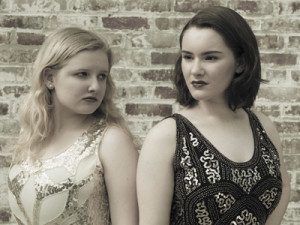 From Left to Right Lily Brenneman as Roxie Hart and Breene Halaby as Velma Kelly. 