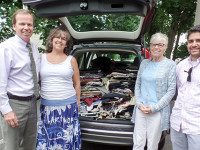 Register donates through Suits for Success