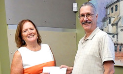 Evening Garden Club presents library donation