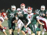 Wolverines fight Panthers in rain