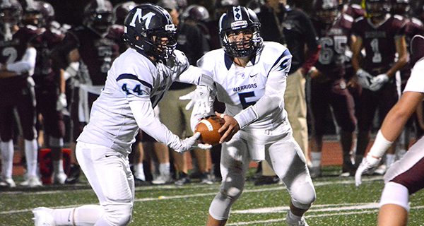 Williams, Warrior football roll in opener