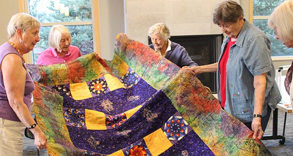 Crafters unite for library quilting evening