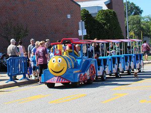 Parents and children were invited for a ride on the train as it circled Westwood Day.