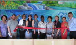 Needham Montessori School cuts ribbon