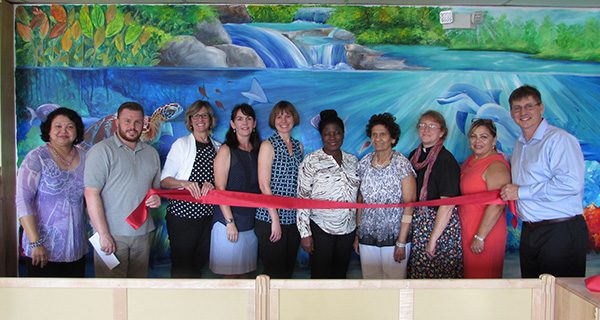 Needham Montessori School cuts ribbon