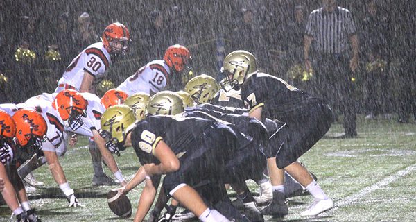 Rebels battle Rockets in the rain