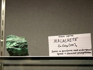 The collection of gems and minerals at the Wellesley Free Library from Rama K. Ramaswamy includes malachite from Africa.
