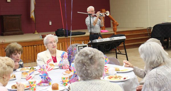 Celebrating longevity with the COA and cake