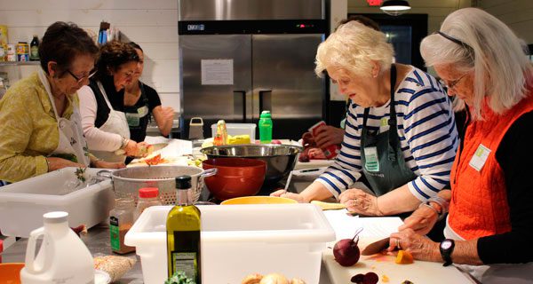 Seniors collaboratively cook at Powisset Farm