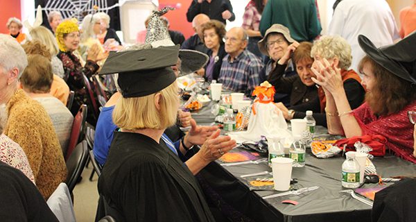 Seniors enjoy a COA Halloween treat