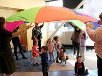 Children gobble up parachute fun