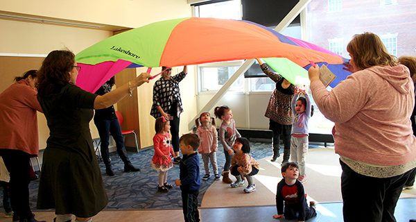 Children gobble up parachute fun