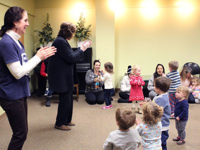 The Dover Town Library’s staff members lead the group of babies and toddlers in song at ‘Super Awesome Fun Time.’