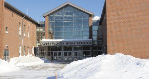 A mountain of snow greets Westwood High School students for their return from two snow days after the bomb cyclone.