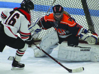 O’Neil, Raiders fight off McInerny, Rebels