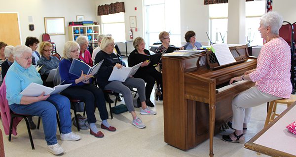 Women’s choir harmonizes the Center