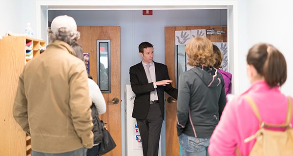 Residents take guided school tours