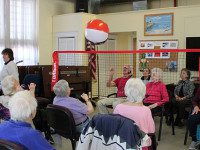 Seniors sit in on volleyball match