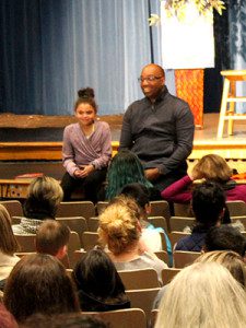 Kwame Alexander invites one of Medfield’s students to read with him on stage.  Photos by Laura Drinan