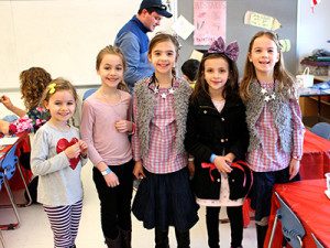 Friends at the Memorial School’s annual Winter Carnival enjoy a fun-filled day together. Photos by Laura Drinan