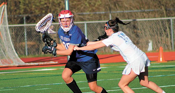 McCarthy, Lady-Warriors best Grosek, Raiders