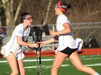 McCarthy, Lady-Warriors best Grosek, Raiders