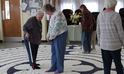 Seniors walk portable labyrinth