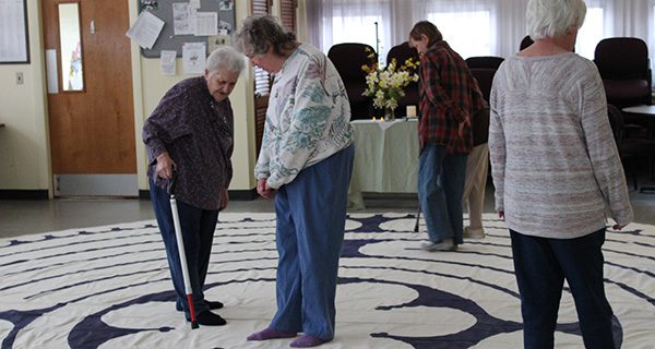 Seniors walk portable labyrinth