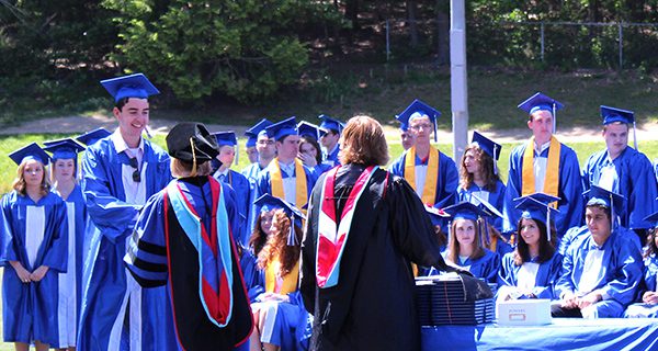 Walpole High grads toss their caps